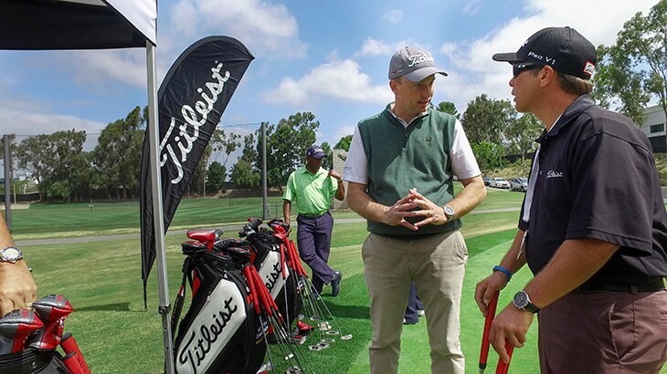 Mike talking putters with Team Titleist member...