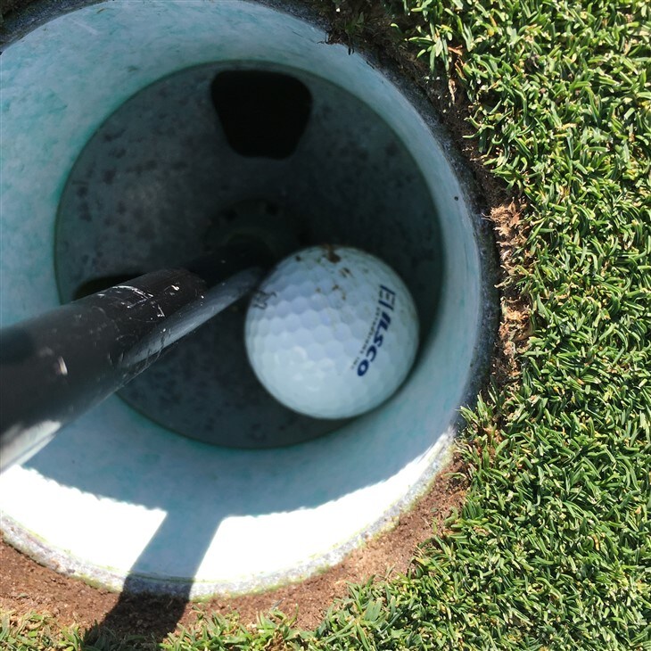 Hole in one with logo ball.
